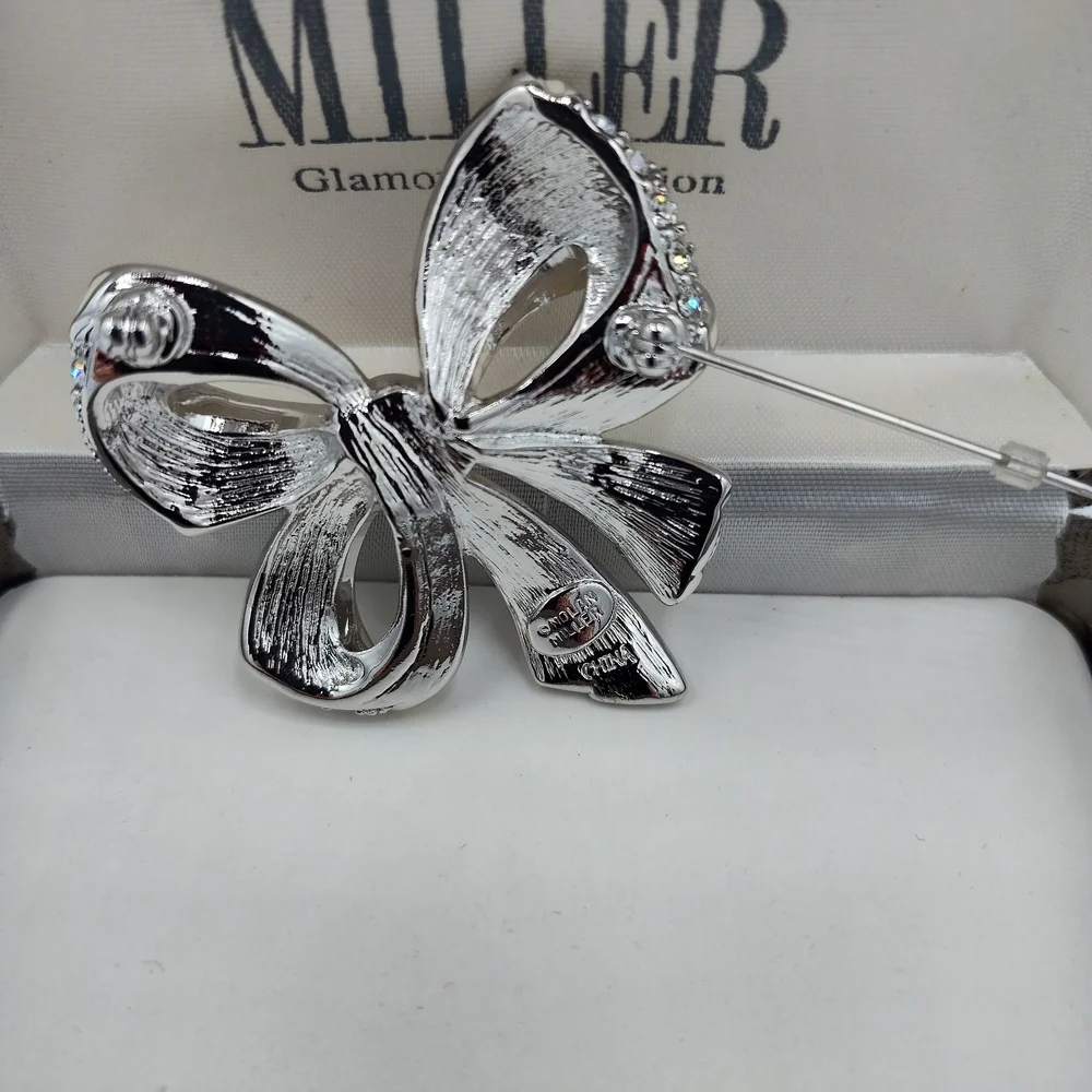 Vintage NIB Nolan Miller Silver-tone Bow Brooch With Rhinestones